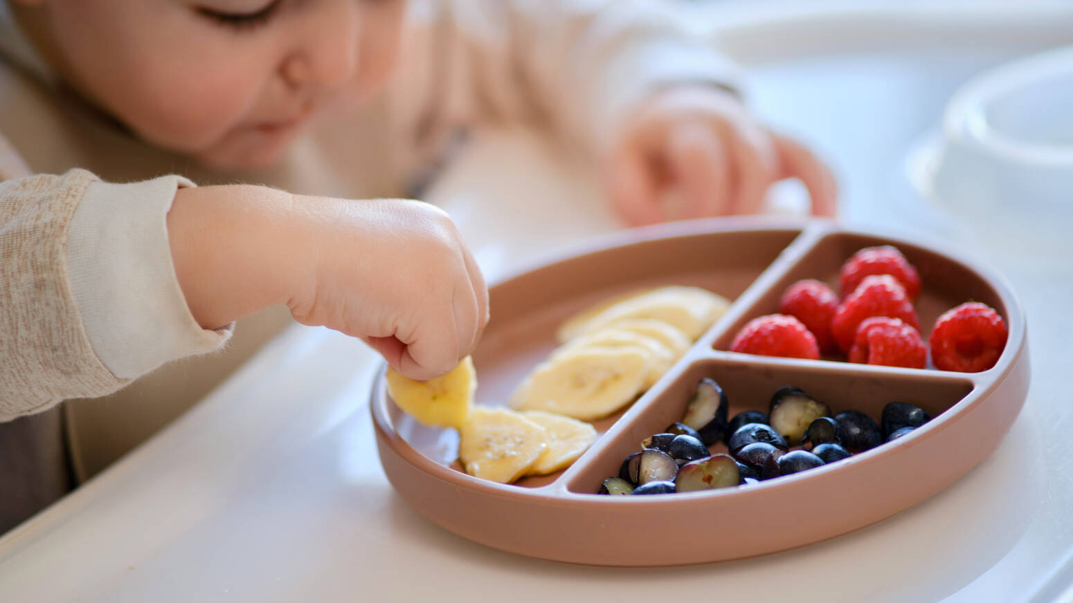 child-eating-fruit