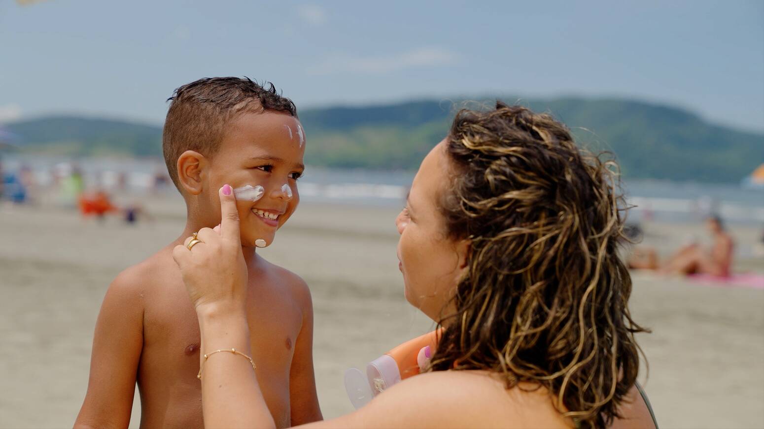 parent-applying-sunscreen-to-child