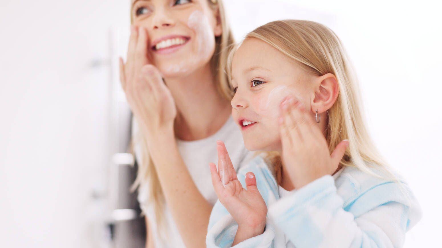 parent-and-child-applying-skincare