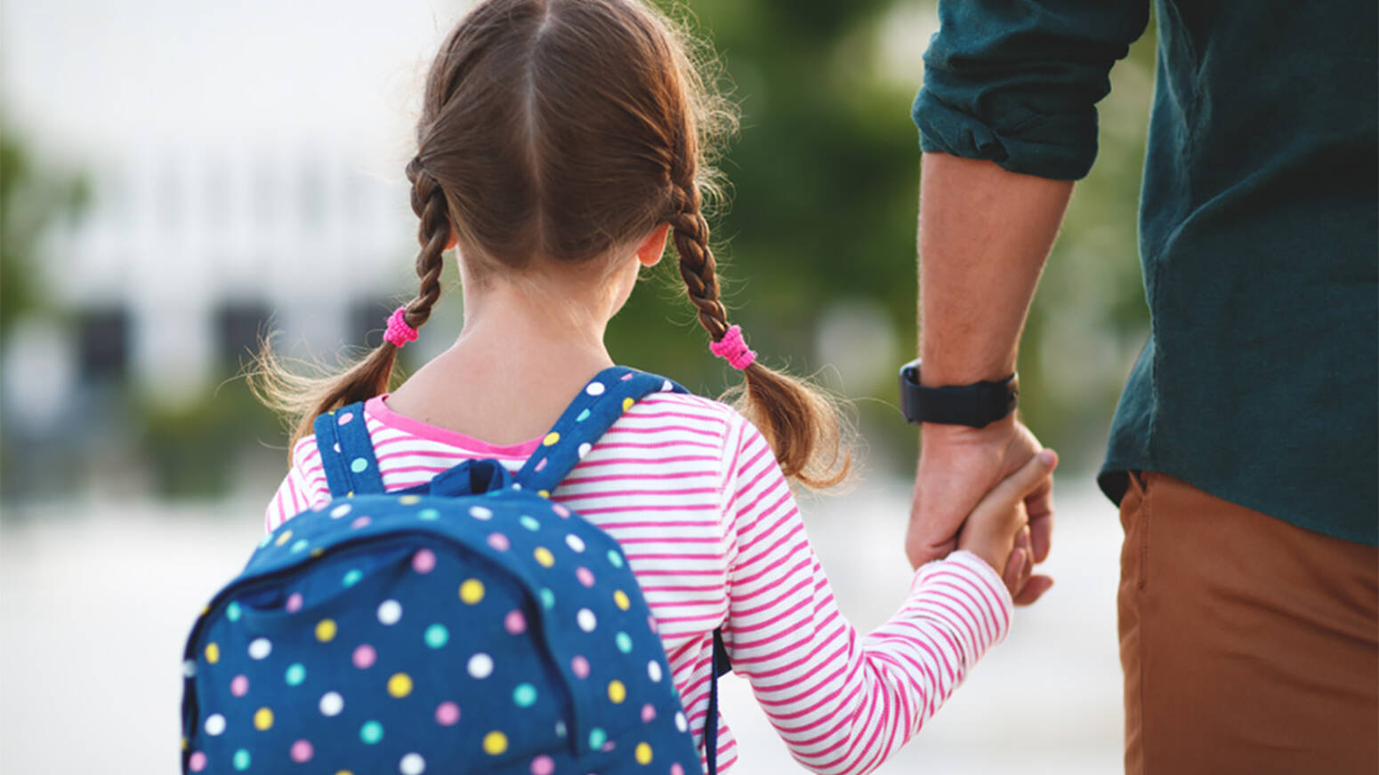 Girl going to school with a backpack
