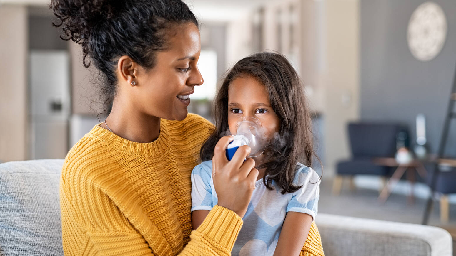 parent-helping-child-with-nebulizer