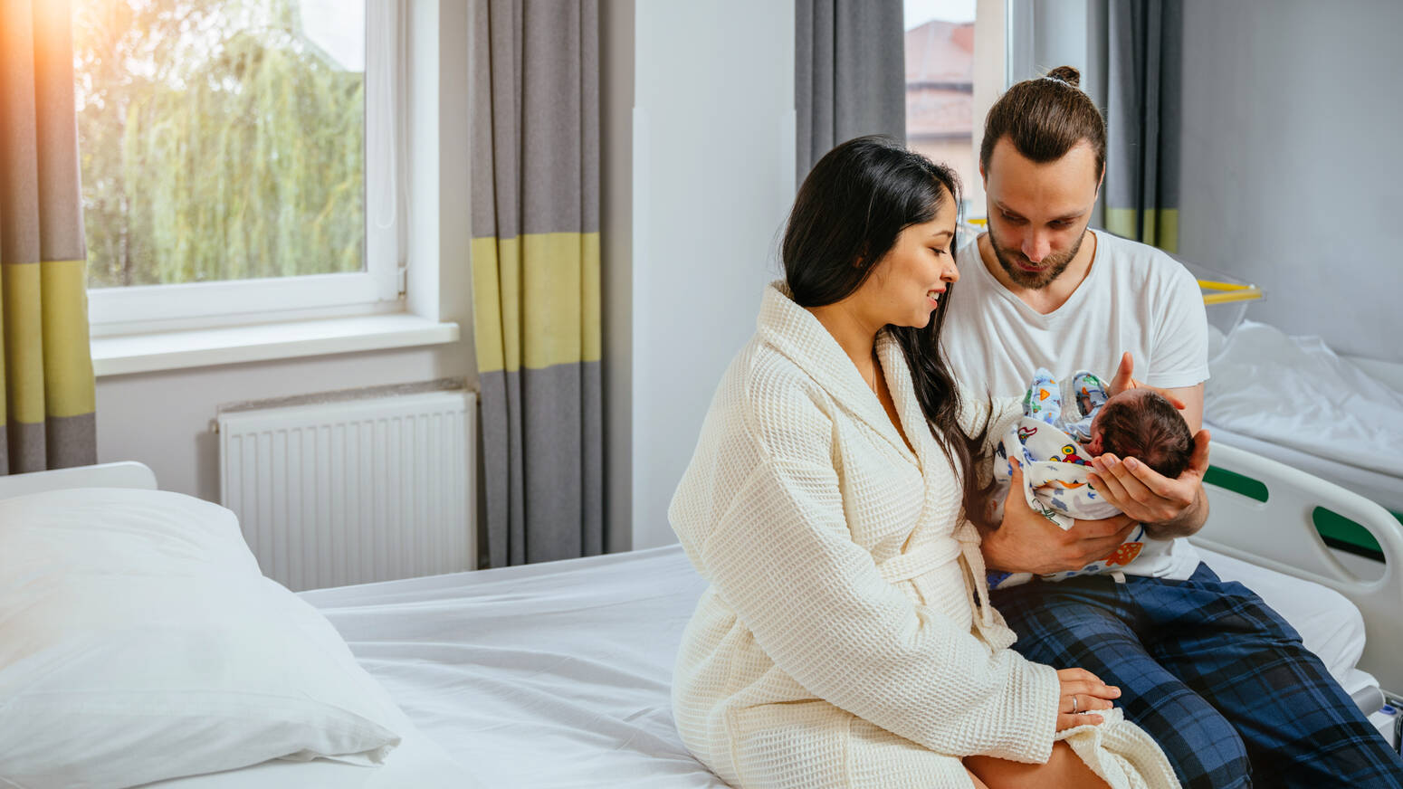 parents_holding_baby