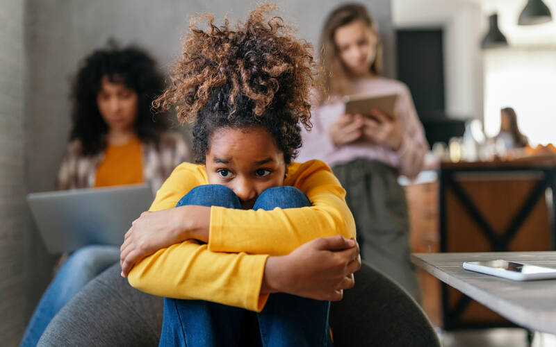 Child-crouching-down