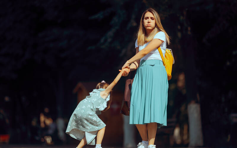 child having a tantrum with mom in public