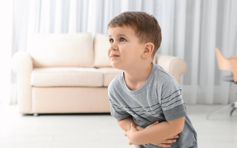 child-holding-stomach