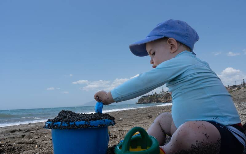 child-playing-at-beach