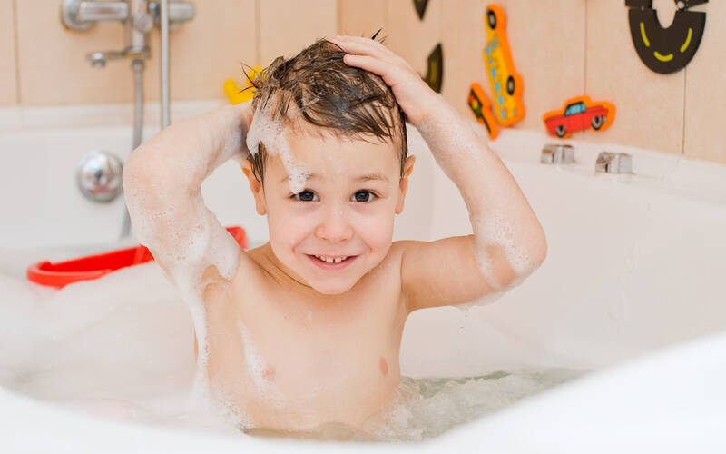 child-taking-a-bath
