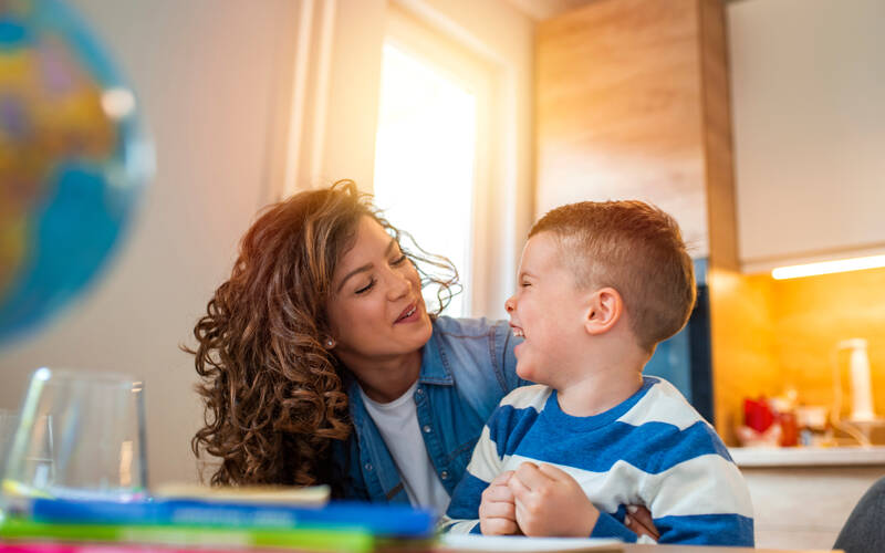 adult and child giggling