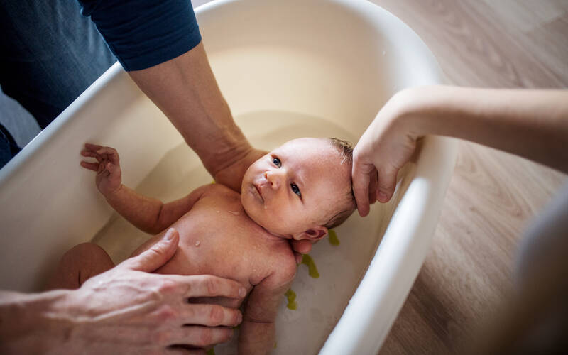Newborn given bath