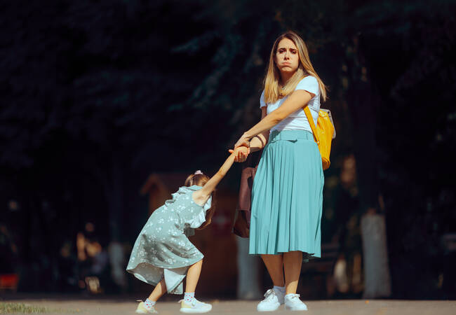 child having a tantrum with mom in public