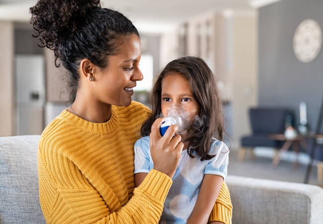 parent-helping-child-with-nebulizer