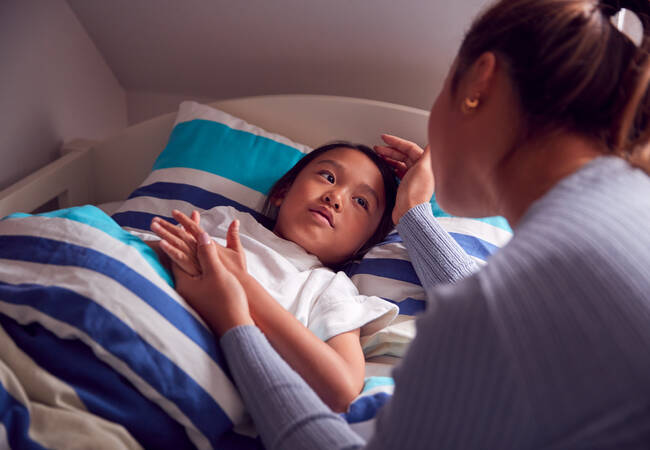 parent-helping-child-go-to-bed