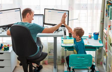 Father and son working from home