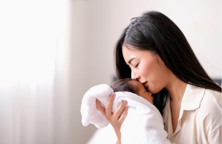 New mom holding baby