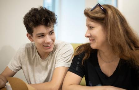 picture of mother and son talking