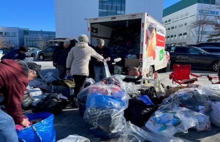 Volunteers load a UHaul with donations bound for Turkey.