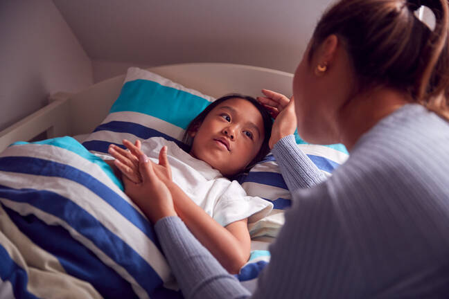 parent-helping-child-go-to-bed