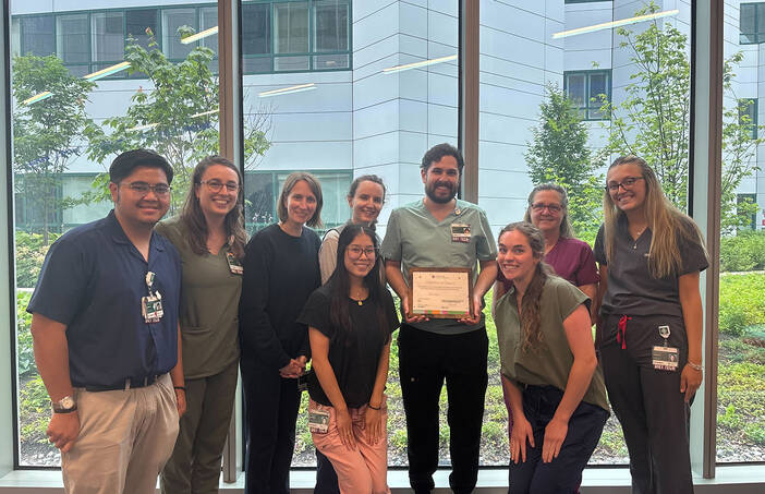 The Milk Lab team: Angelo Alvarez, Micaela Moravek, Margaret Bellerive, Allison M. Lawson, Emma Stelzner, Team Lead Derry LaBombard, Eden Larsen, Ginger Farineau, Keatyn Horne