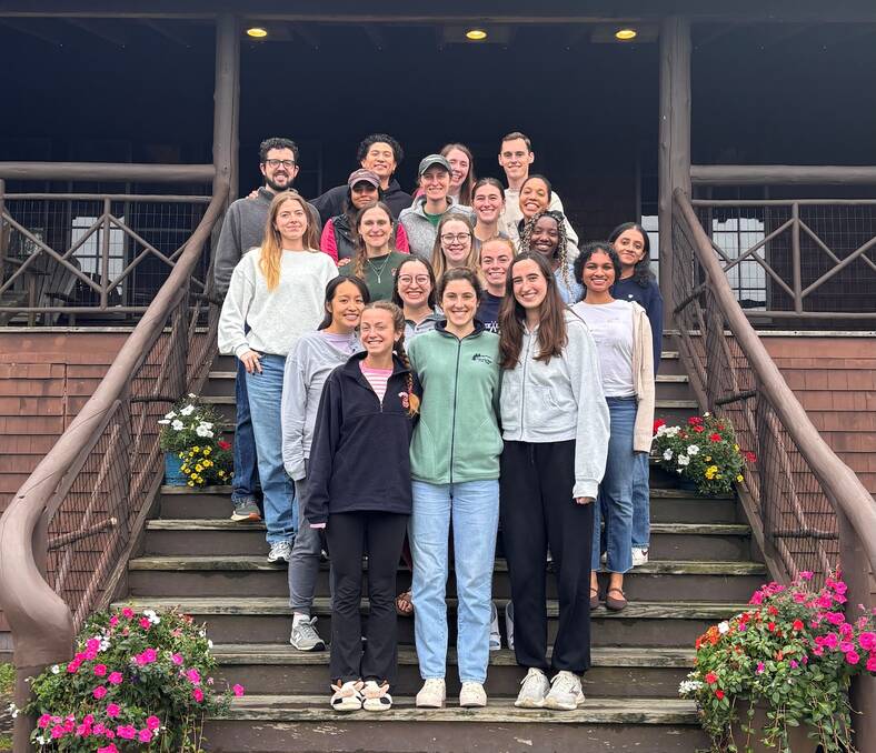 Pediatric residents standing on a stairway